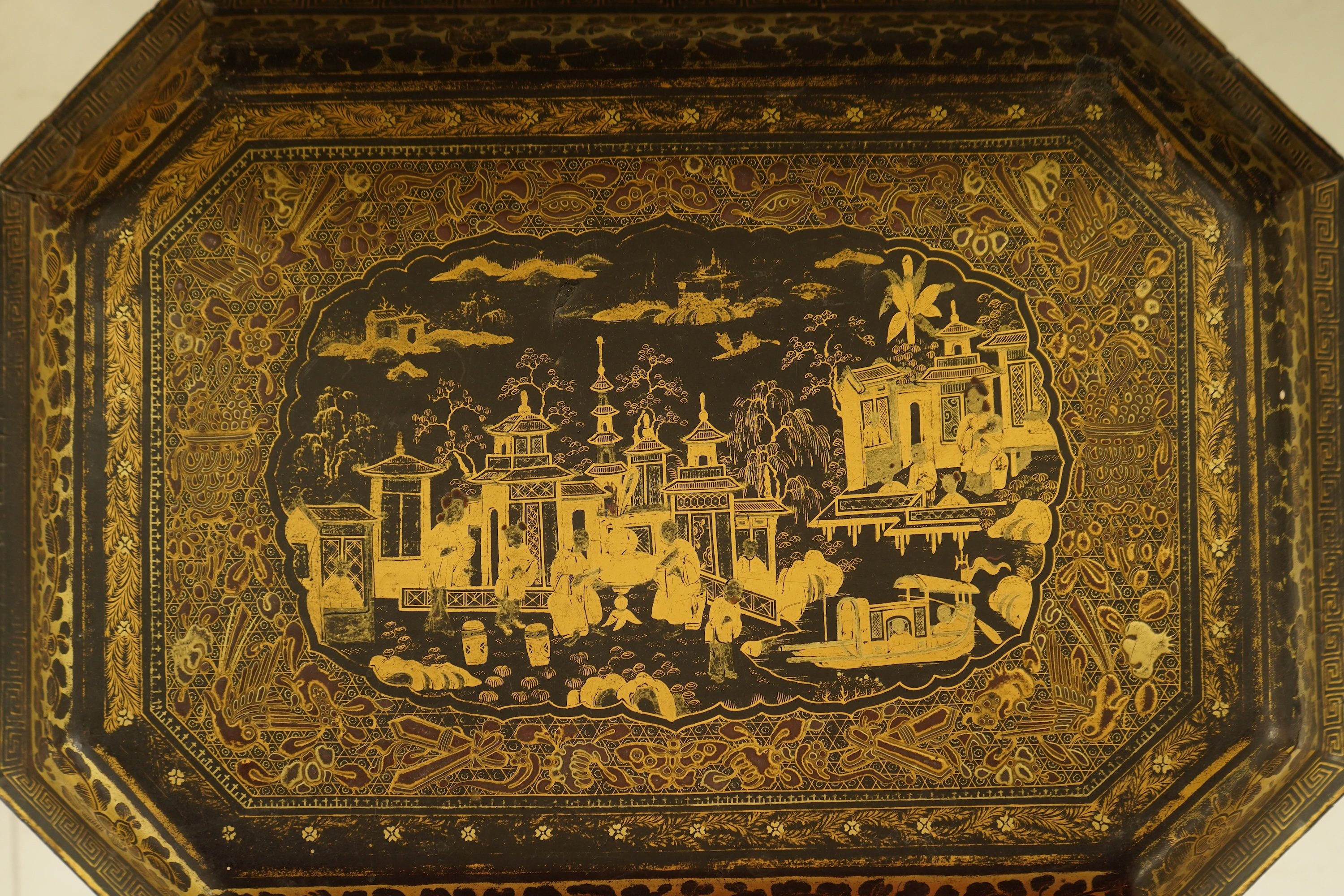 A Chinese export octagonal lacquered work box with fitted interior, 35cm wide